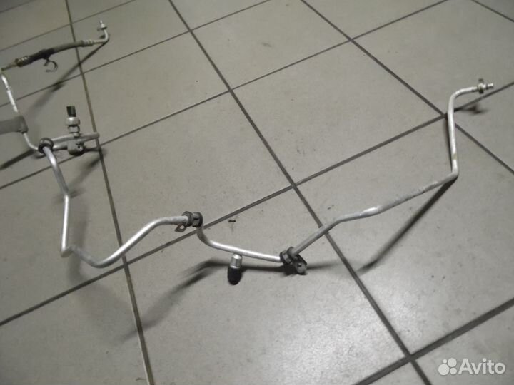 Трубка кондиционера Рено Логан 2