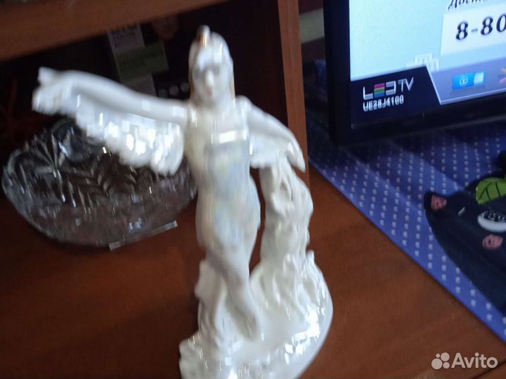 Статуэткаптица