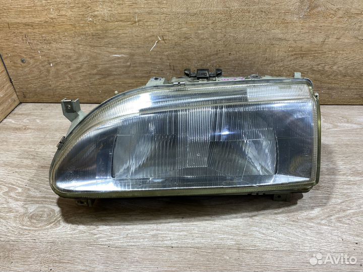 Фара передняя левая Renault 19 2 142369