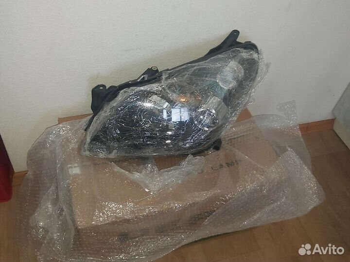 Фара левая Opel Astra h xenon