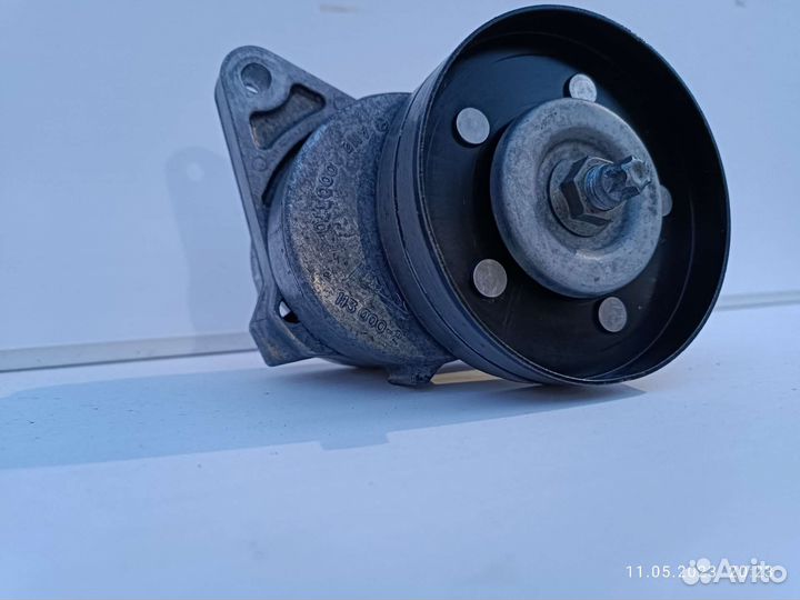 Натяжной ролик