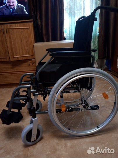 Кресло коляска для инвалидов