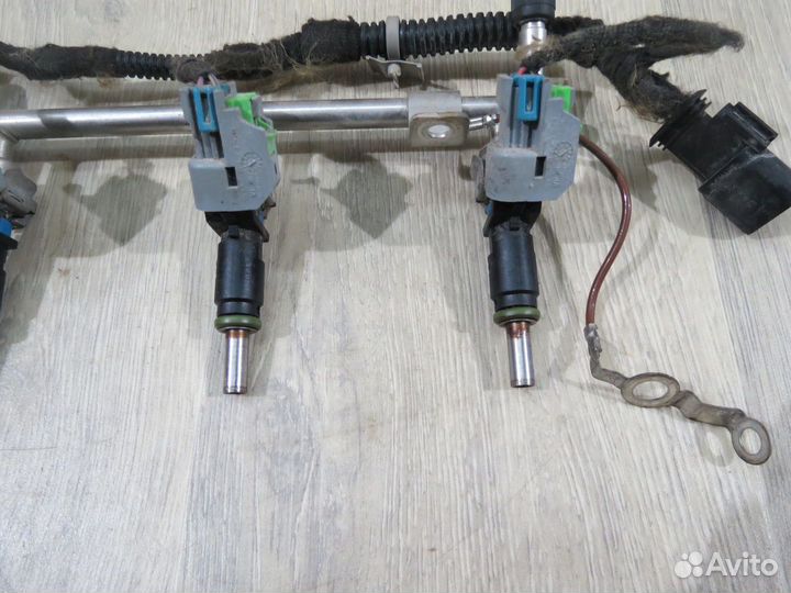 Форсунка топливная Opel Astra J