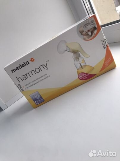Молокоотсос medela ручной