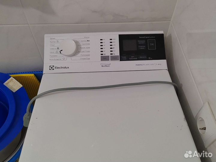 Стиральная машина с вертикальной загрузкой