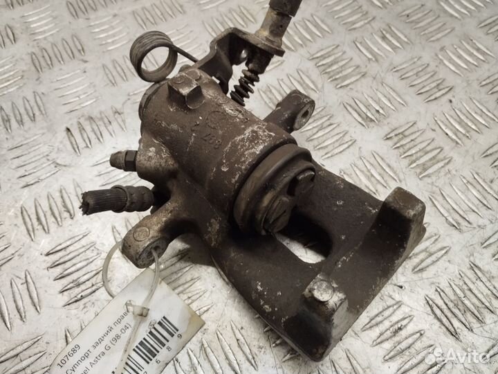 Суппорт задний правый Opel Astra G Zafira A