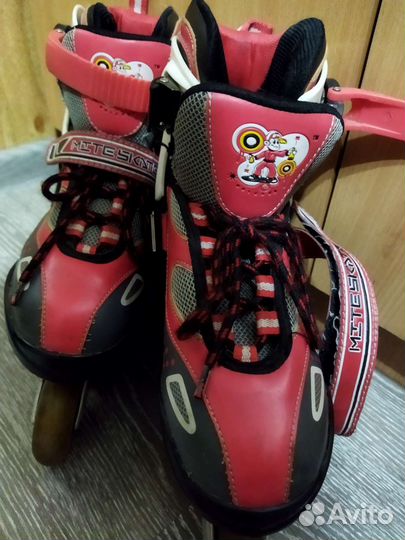 Роликовые коньки