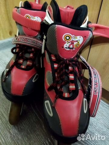 Роликовые коньки