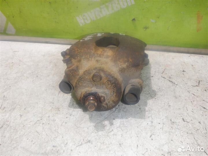 Суппорт передний левый Фольксваген Гольф 4 Бора