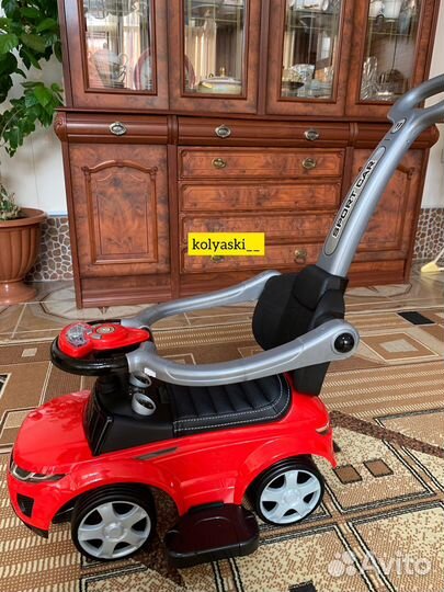 Машинка каталка с ручкой