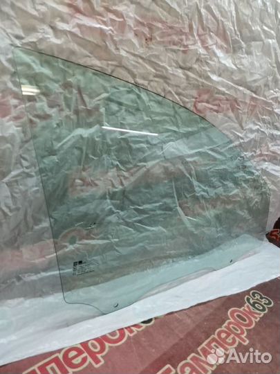 Стекло двери переднее правое Opel Astra J