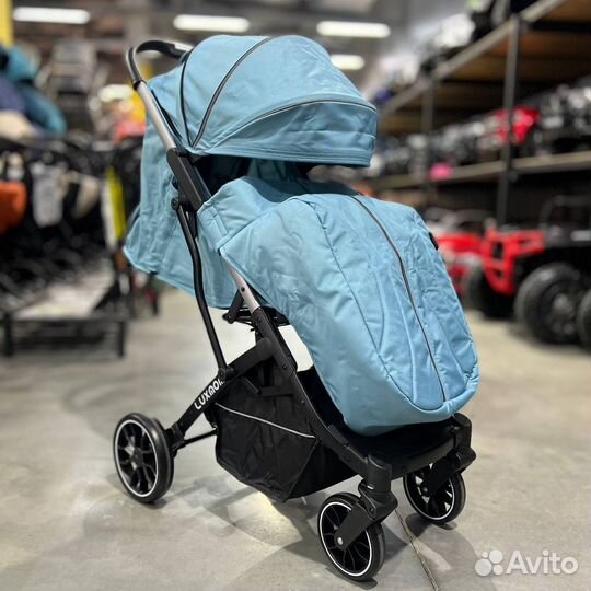 Прогулочная коляска новая