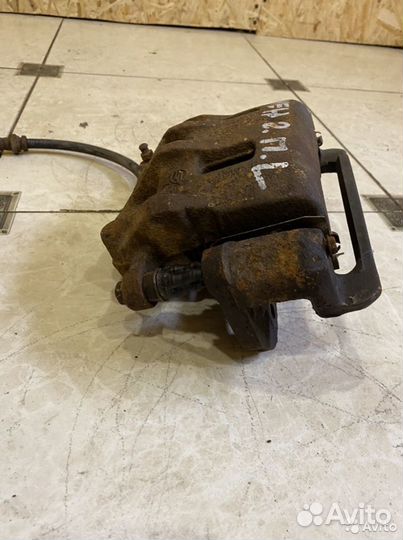 Тормозной суппорт перед лев SsangYong Kyron