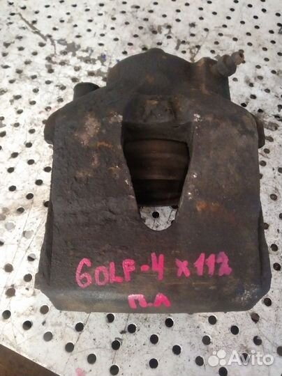 Суппорт тормозной передний левый Volkswagen Golf