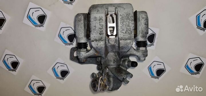 Суппорт задний, левый тормозной Хонда Цивик 4 д