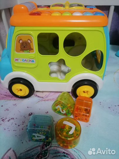 Игрушка музыкальный автобус