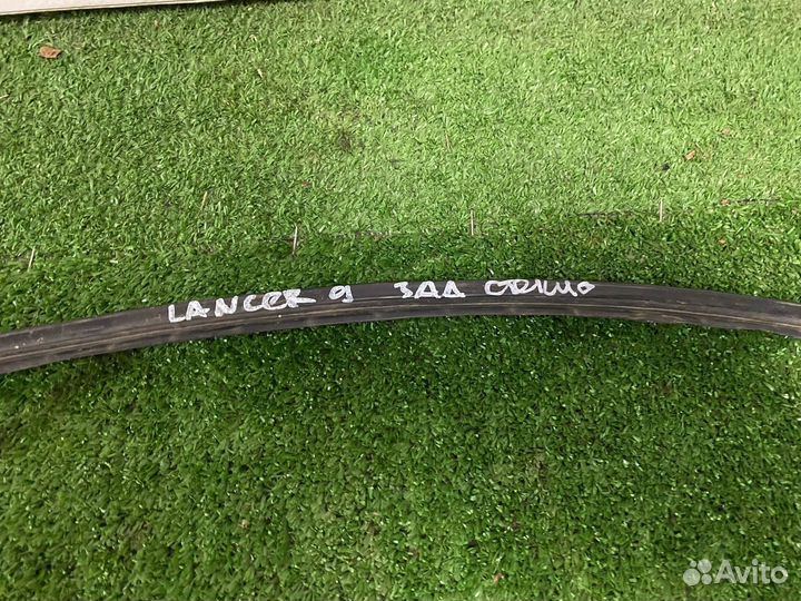 Уплотнитель заднего стекла Mitsubishi lancer 9