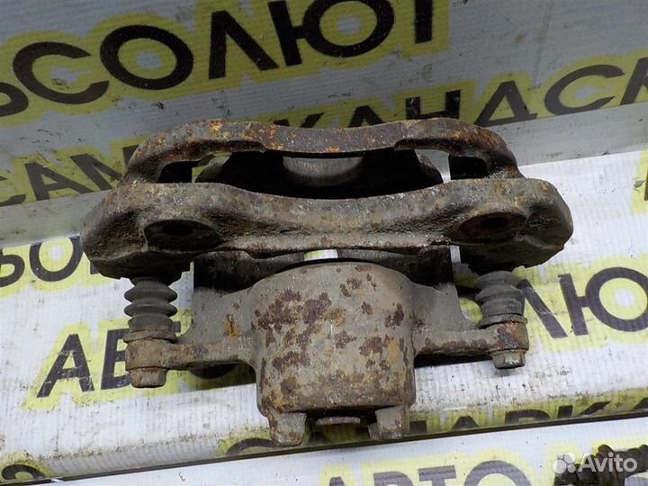 Суппорт передний левый Mitsubishi Lancer 9 (CS) 2