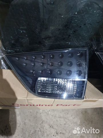 Фонарь в крышку багажника Mitsubishi Outlander XL