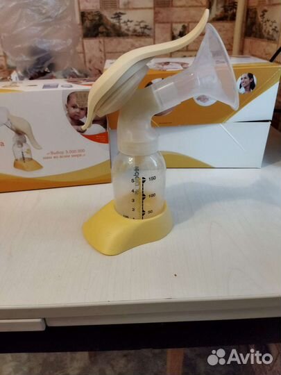 Ручной молокоотсос Медела