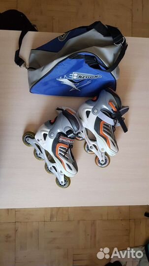 Роликовые коньки