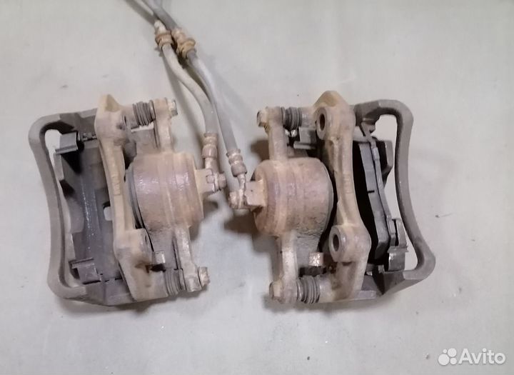 Суппорт тормозн.передн.Nissan Almera N15 CD20 1997