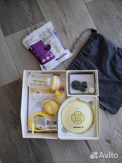 Молокоотсос Medela Swing электрический