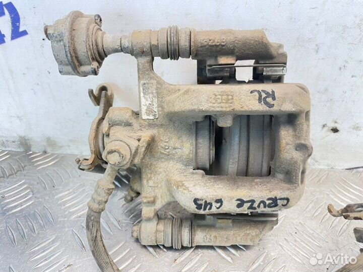 Суппорт тормозной задний левый Chevrolet Cruze