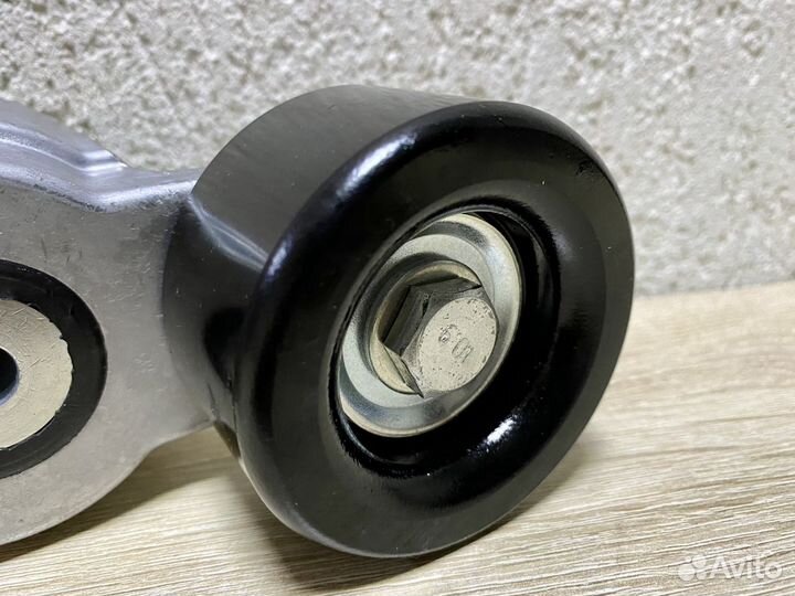Натяжитель ремня на Газель Cummins 2.8