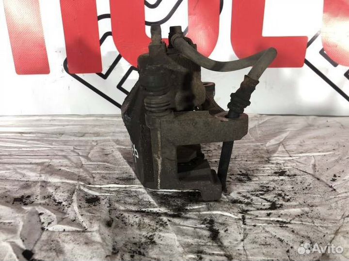 Суппорт тормозной передний левый Mazda Cx-5 1