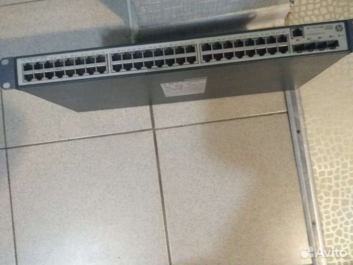 Рабочий коммутатор.HP V1910-48G. Switch J 009A