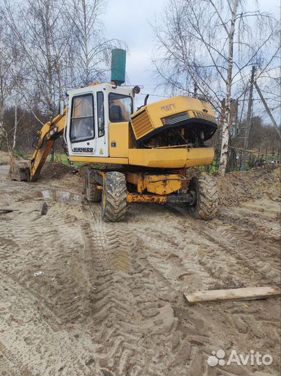 Услуги колёсного экскаватора