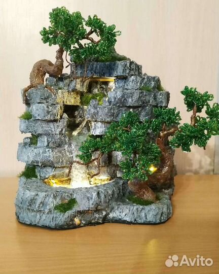 Скала с водопадом