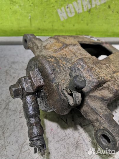 Суппорт передний правый Шевроле Ланос