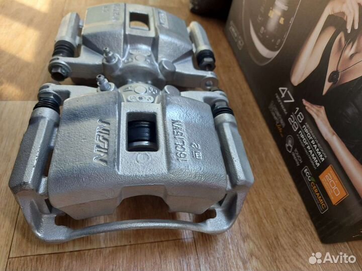 Суппорта передние Honda civic 8 4d Оригинал