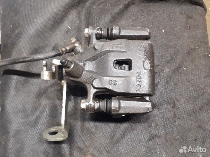 Суппорт задний Mazda 6 gj