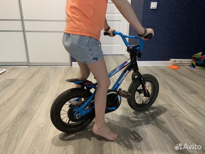 Велосипед с боковыми колесами