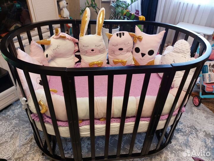 Детская кроватка с маятником круглая