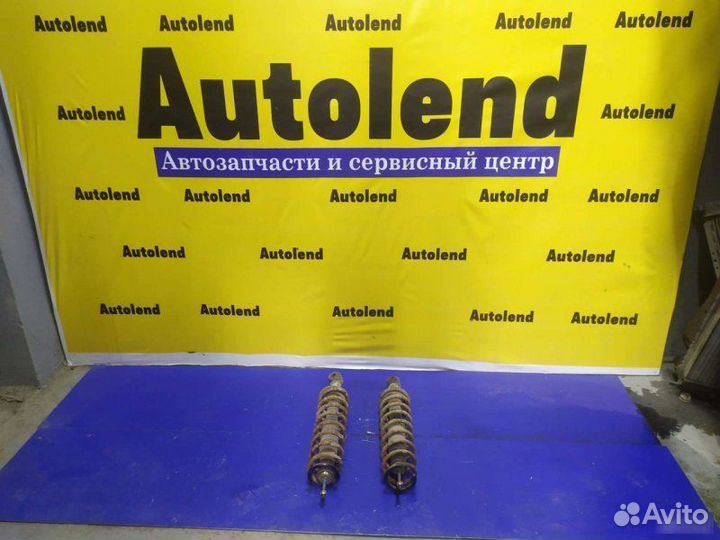 Стойка амортизатора задняя Mitsubishi Lancer 9