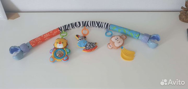 Дуга с игрушками