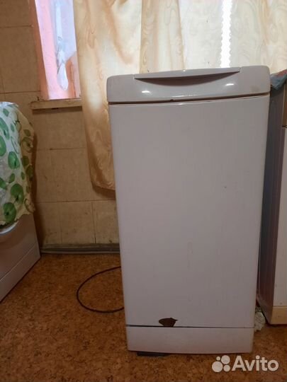 Стиральная машина с вертикальной загрузкой