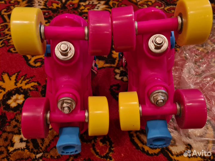 Роликовые коньки