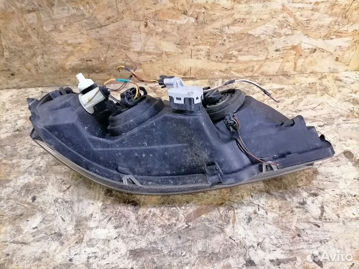 Фара левая Opel Astra G