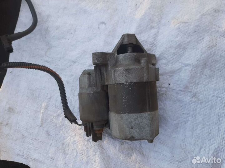 Стартер симбол клио логан 1.4