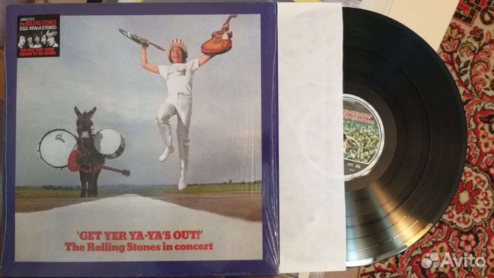 Пластинки Eric Clapton, Rolling Stones, Kiss, Ac/D