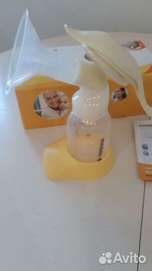 Молокоотсос medela ручной