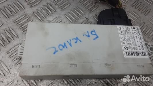 Блок управления бесключевым доступом BMW 3 E90/E91