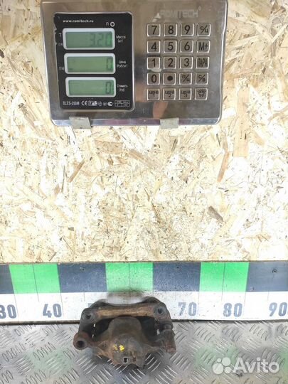 Суппорт передний левый Hyundai Accent 1994-2000