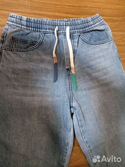 Джинсы бананы