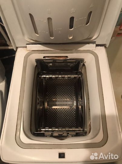 Стиральная машина с вертикальной загрузкой Indesit